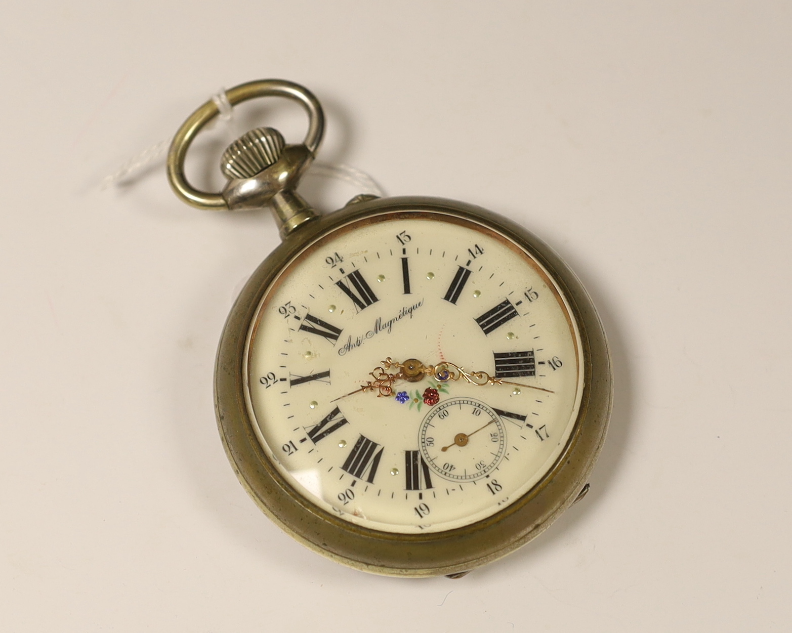 An early 20th century French nickel cased keyless pocket watch, with Roman dial and subsidiary seconds, case diameter 65mm, in leather carrying case.
